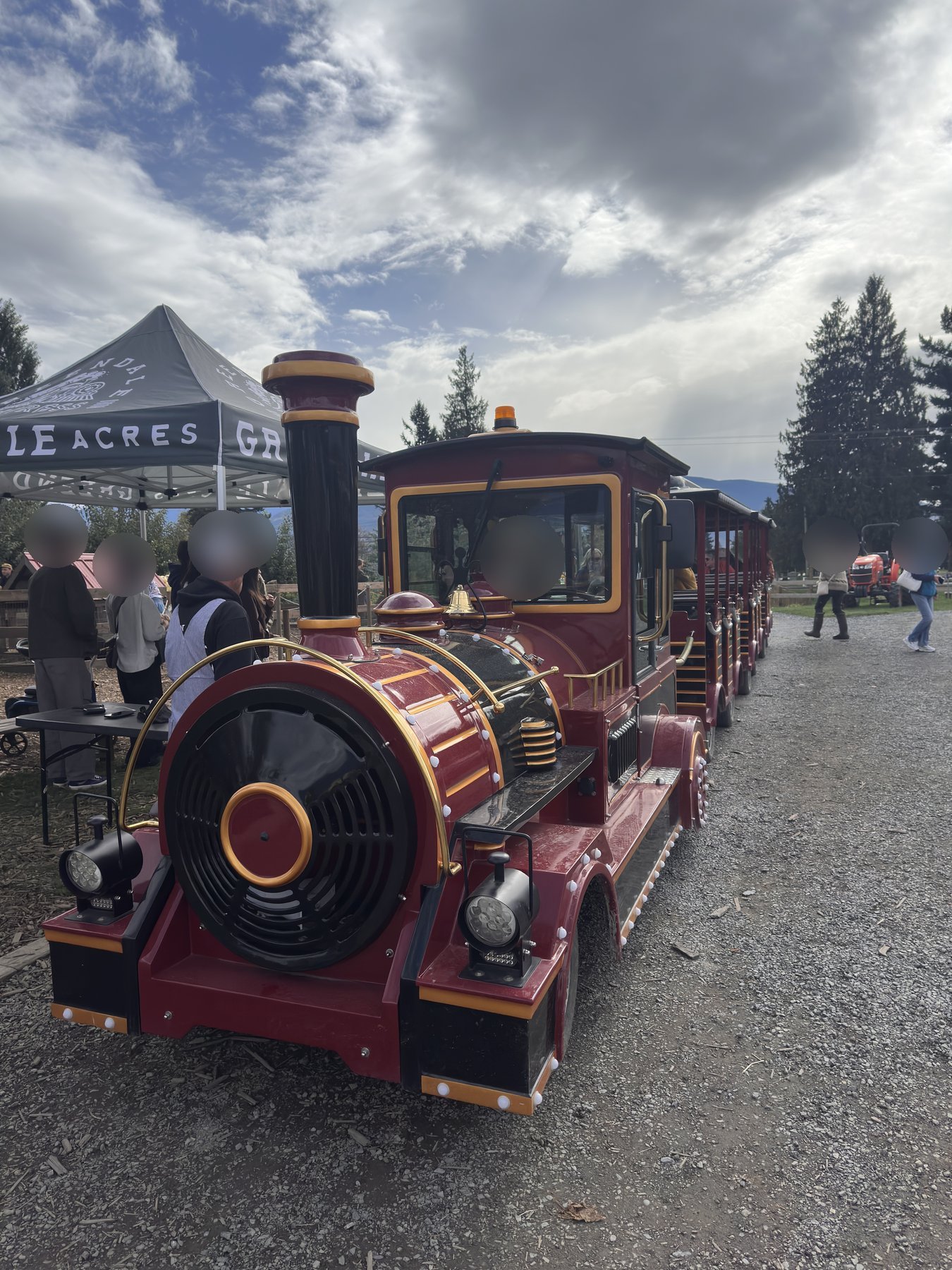 Red and gold Greendale Express trackless train